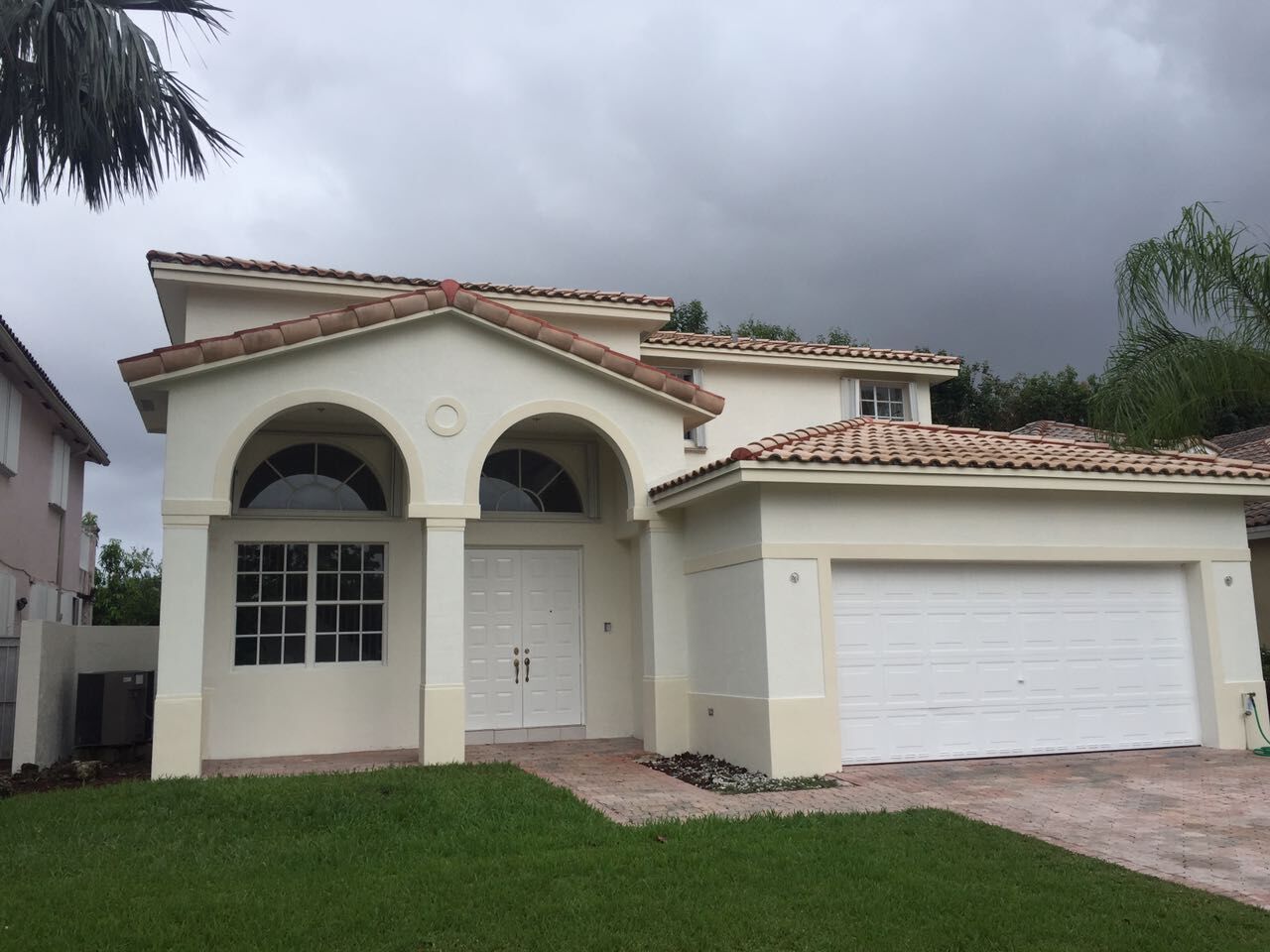 Exterior house painting by CertaPro painters in Doral, FL