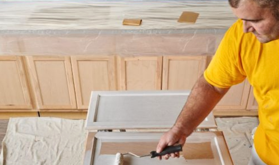 Paint / Stain is Applied to Doors while painting kitchen cabinets