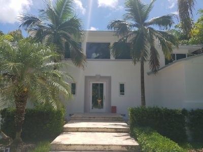 Exterior house painting by CertaPro painters in North Bay Island, FL
