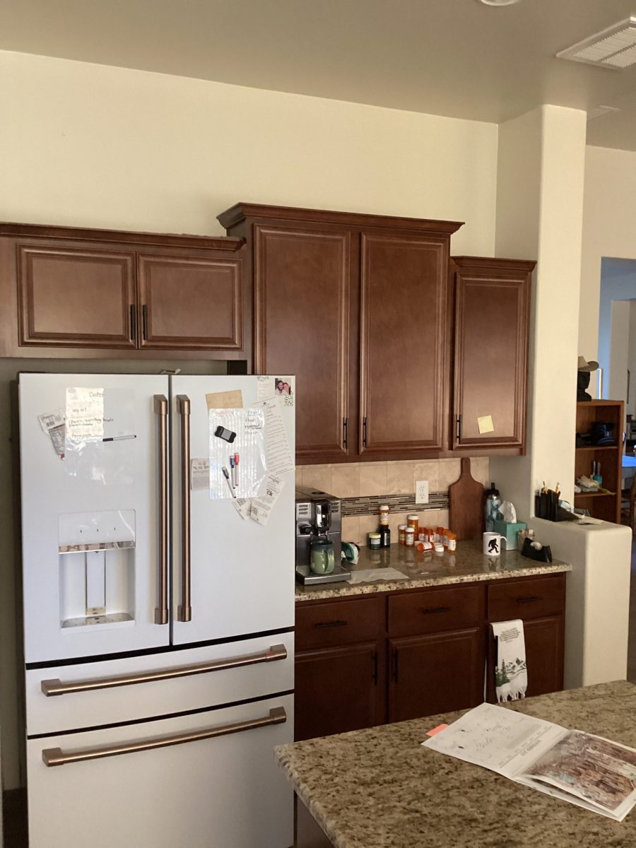 kitchen with white fridge and brown cabinets Preview Image 2