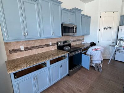gray blue kitchen cabinet above stove