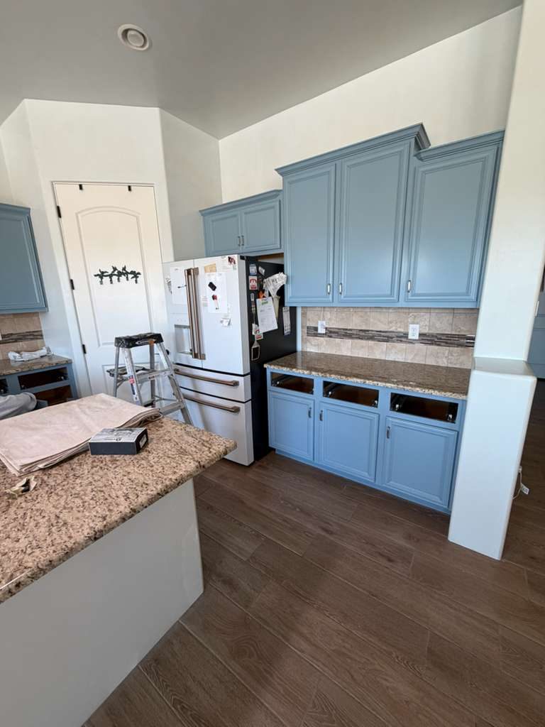kitchen with refinished blue cabinets and granite coutertop Preview Image 3