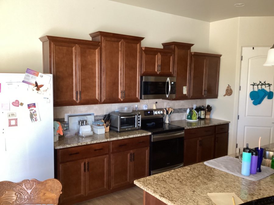 brown cabinets in kitchen with granite countertop island Preview Image 1