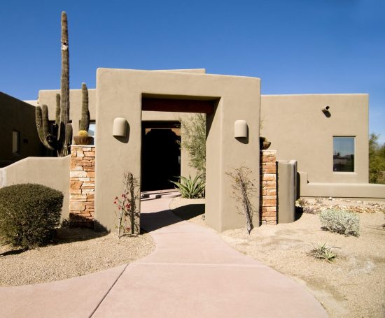brown stucco entryway to home