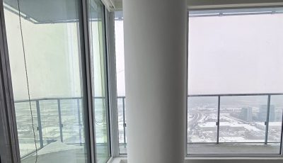 column and floor to ceiling windows in condo