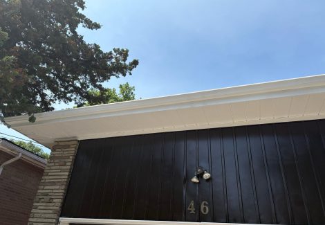 brown painted garage door and siding