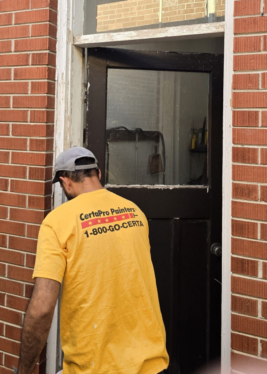 painter working on exterior door Preview Image 5