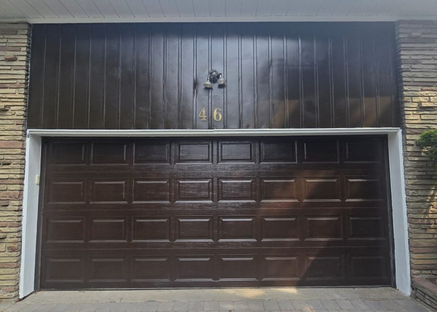 brown painted garage door and siding