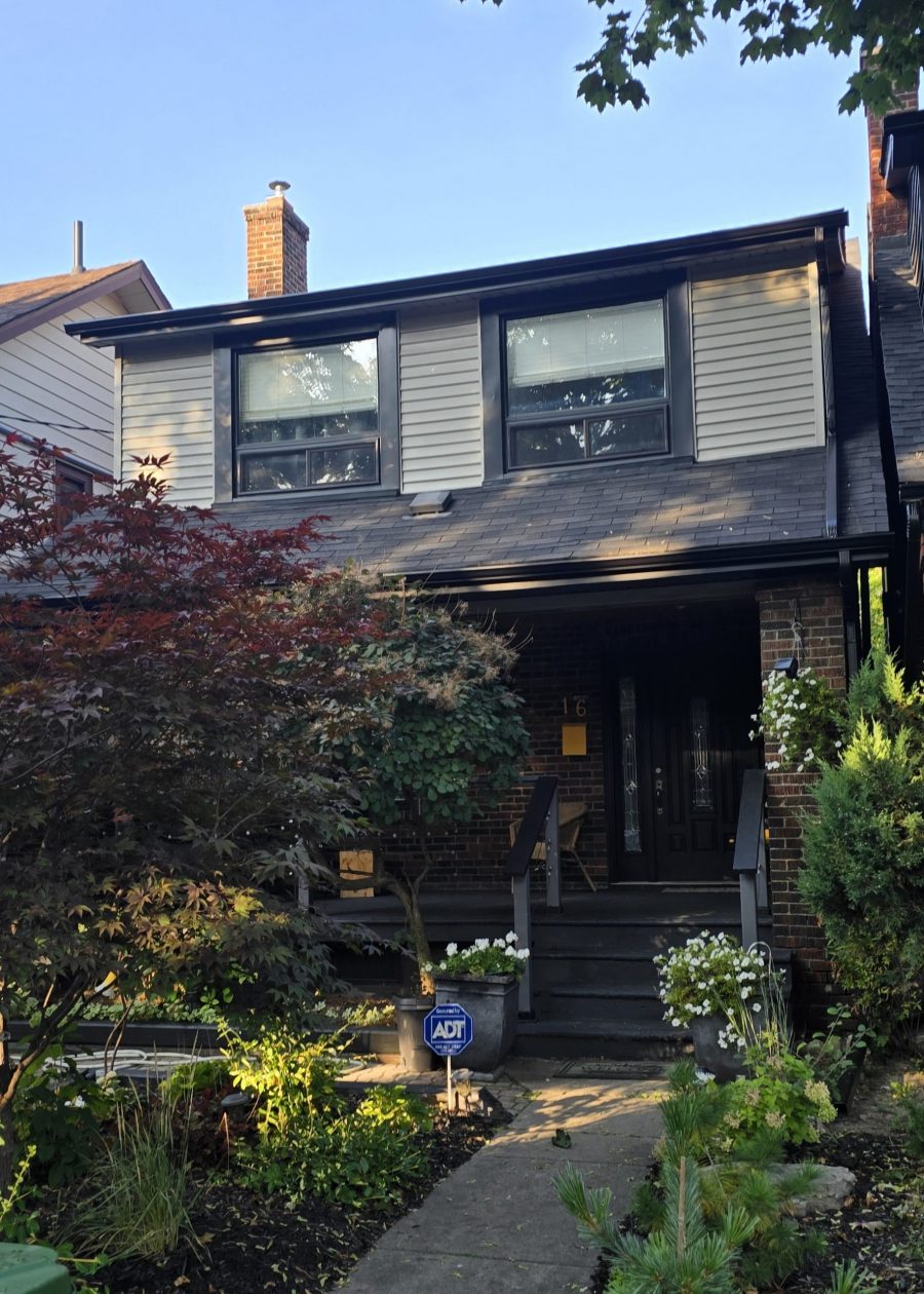 front exterior of house with brick and beige siding Preview Image 3