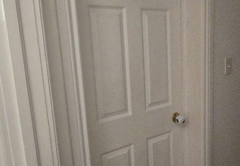 home interior door before paint refresh