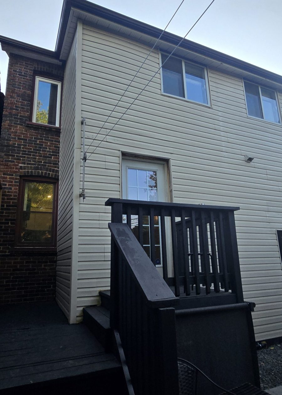 front exterior of house with brick and beige siding Preview Image 5