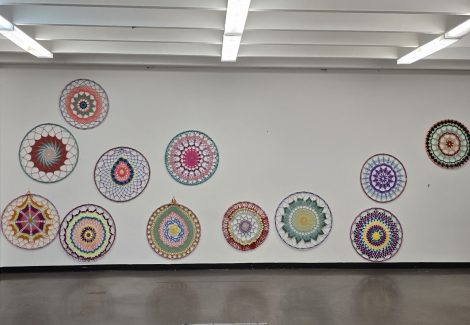 white commercial interior wall with knit art