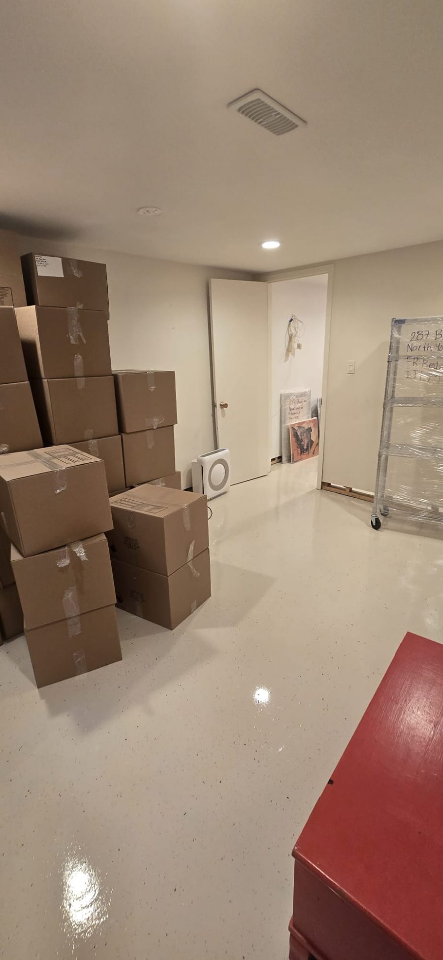 cardboard boxes stacked in corner of room Preview Image 1