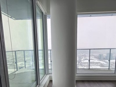 column and floor to ceiling windows in condo