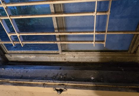 window with damaged window frame