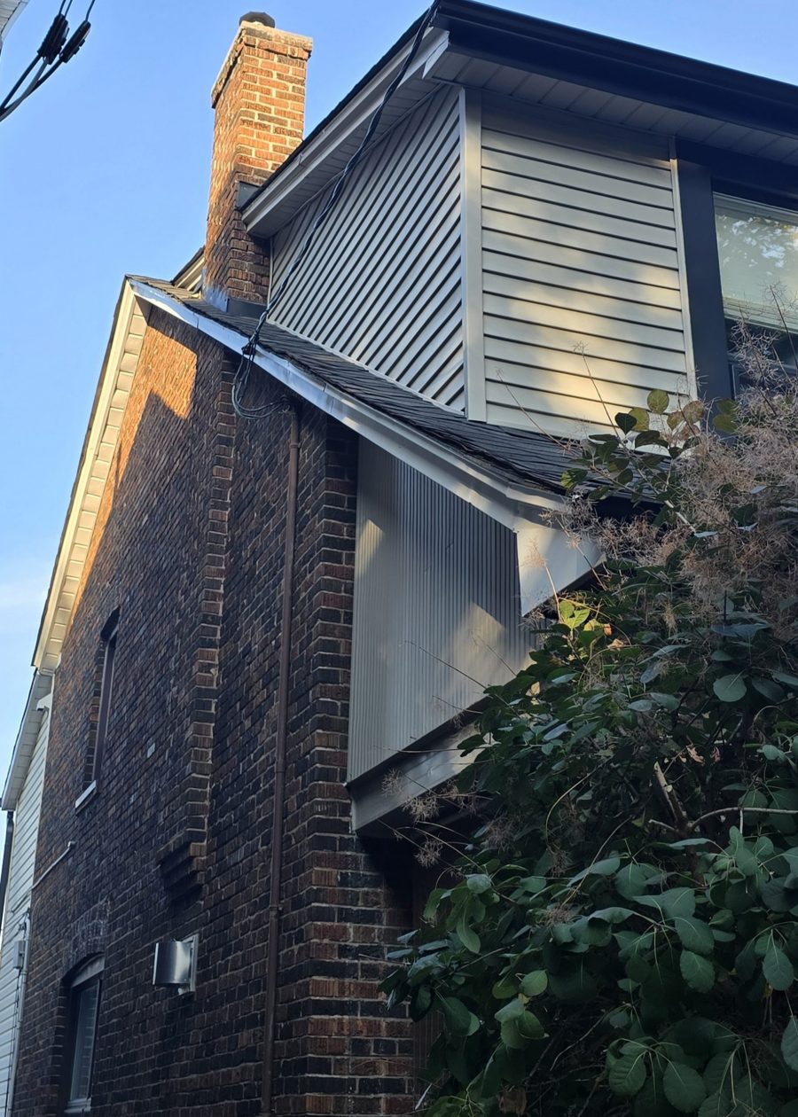 front exterior of house with brick and beige siding Preview Image 4