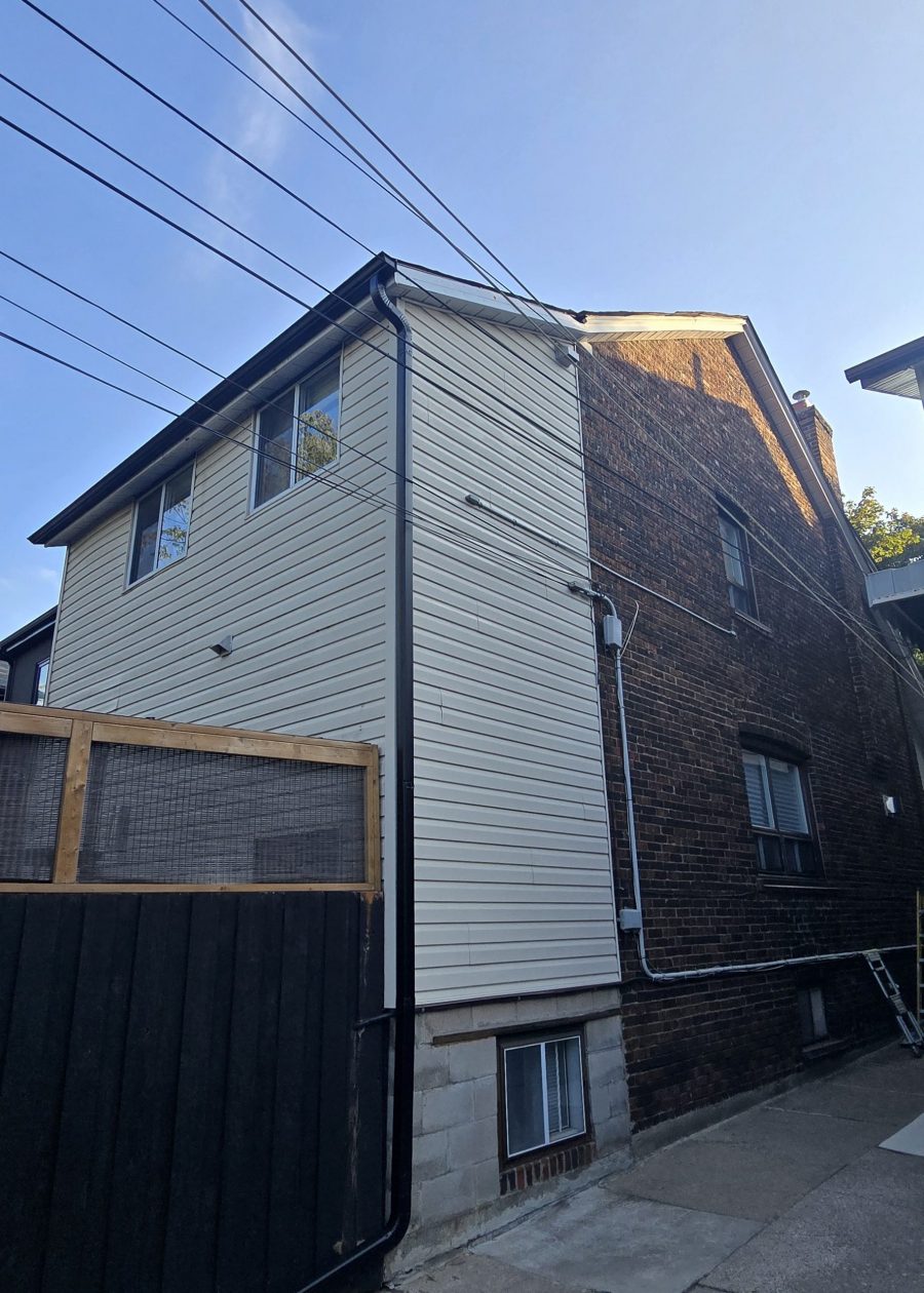 rear side house exterior with brick and beige siding Preview Image 6