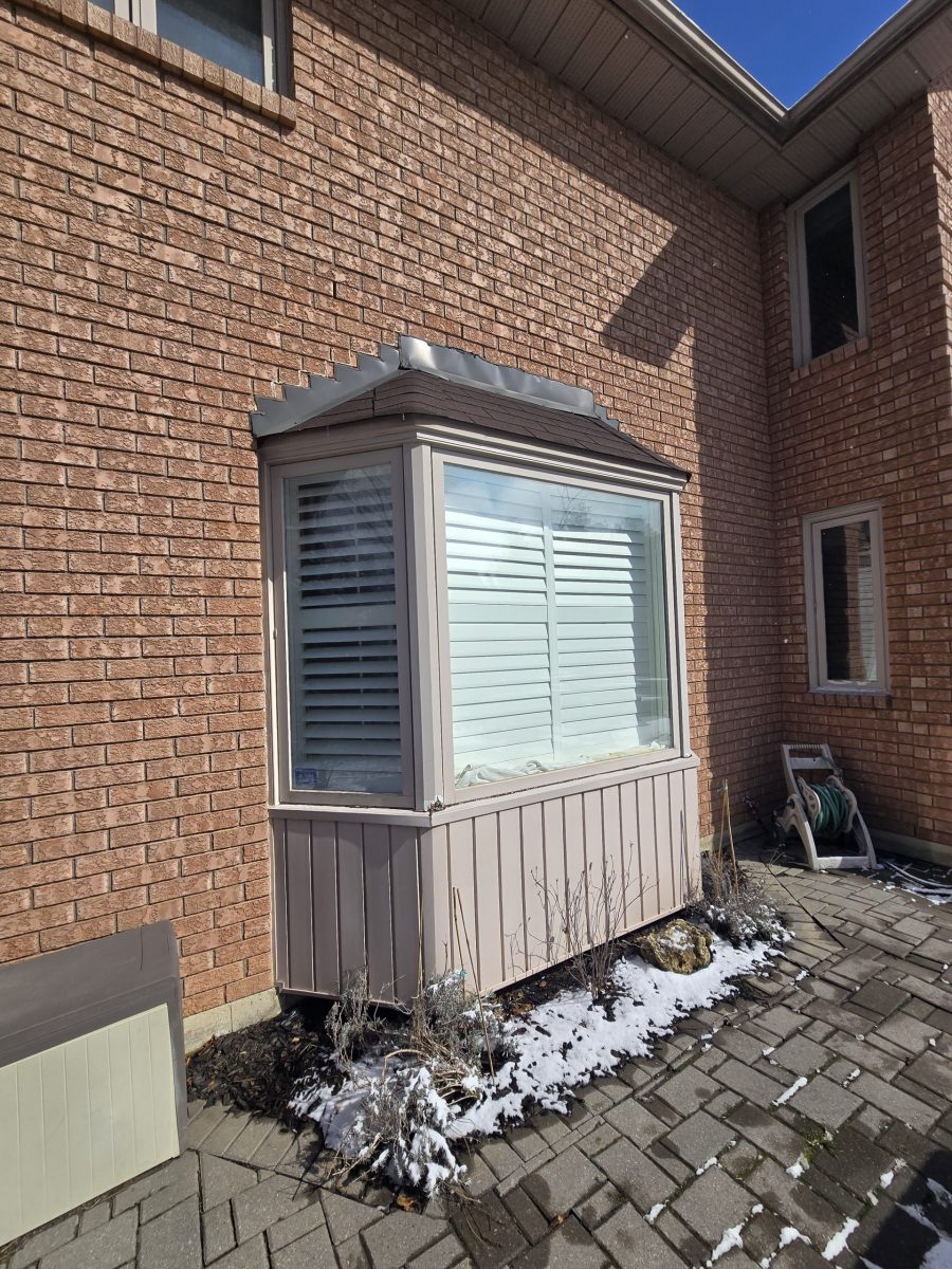brick house exterior with worn wood trim and accents Preview Image 3