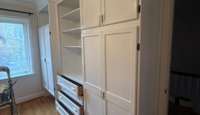 white painted built in cabinets