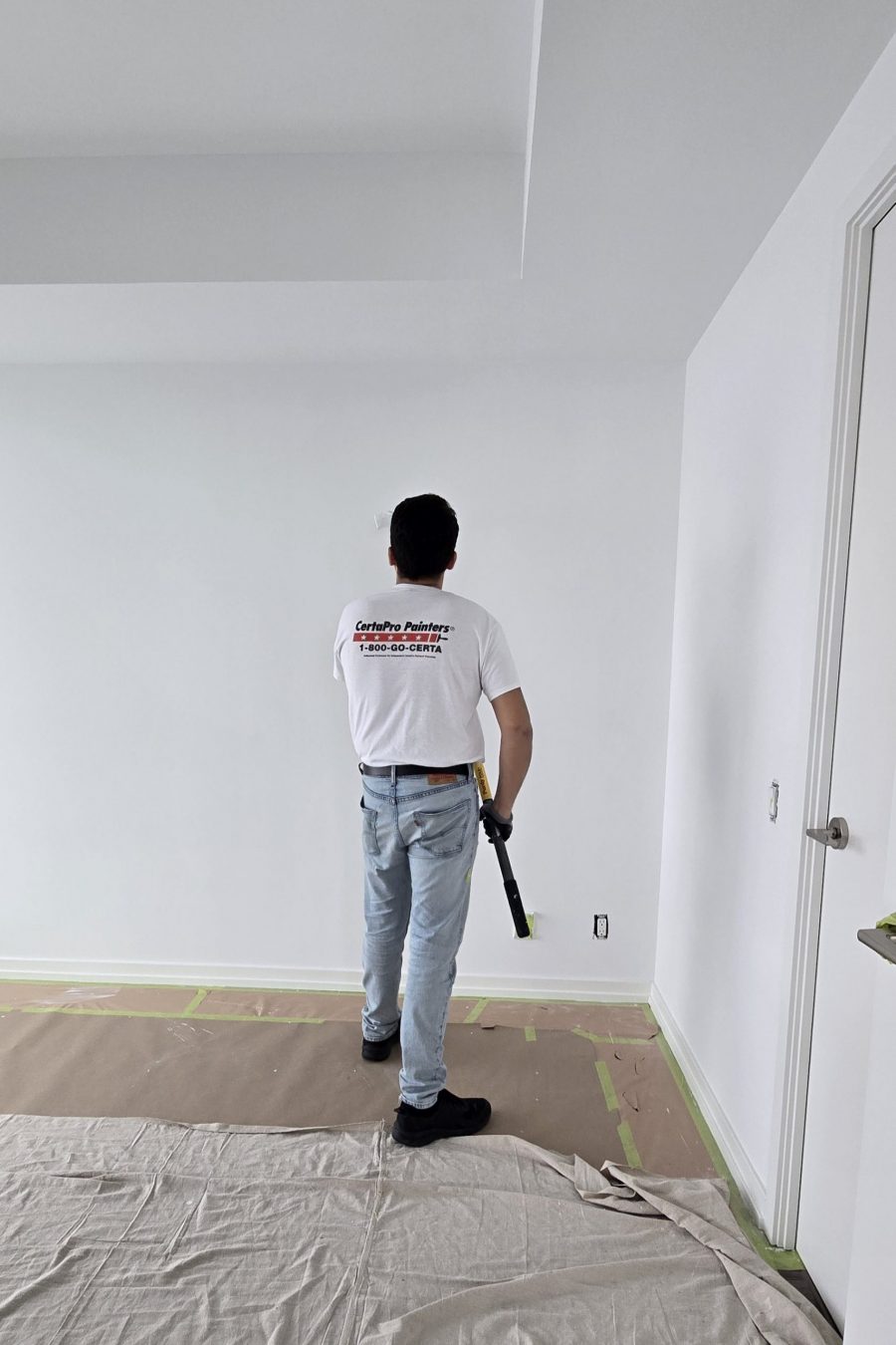 painter working on interior white wall Preview Image 15