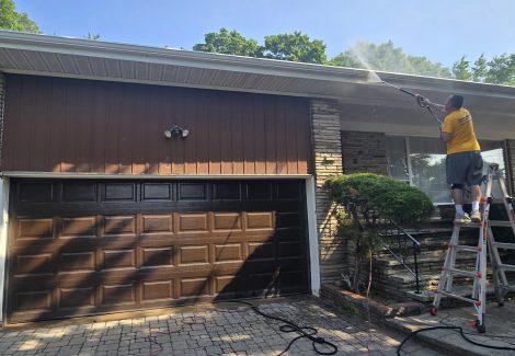 primed garage door during repaint