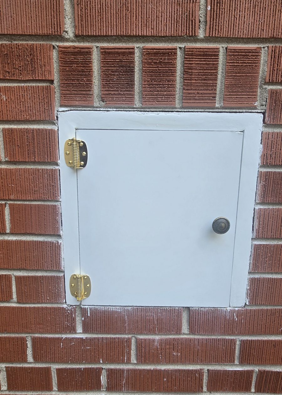 brick wall with small white door Preview Image 3