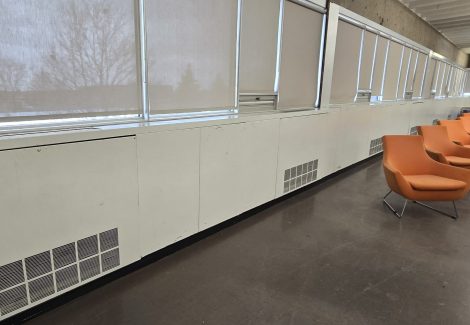 commercial interior space with scuffed white walls