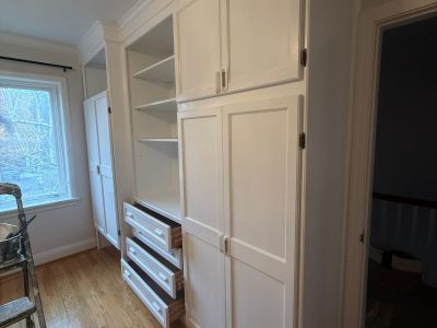 white painted built in cabinets