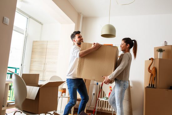 couple moving box