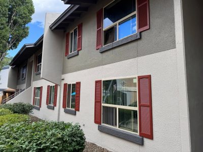 multi-color painted stucco apartment exterior