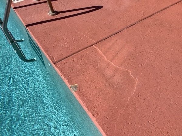pool deck with worn paint Preview Image 4