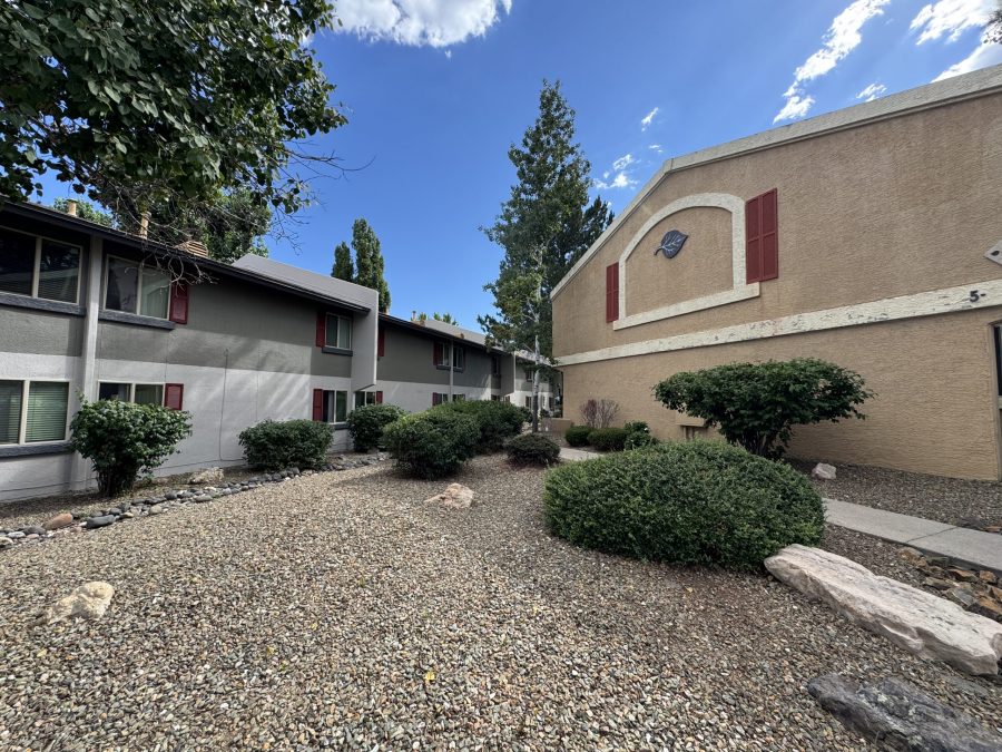 tan stucco apartment building exterior with damage Preview Image 11