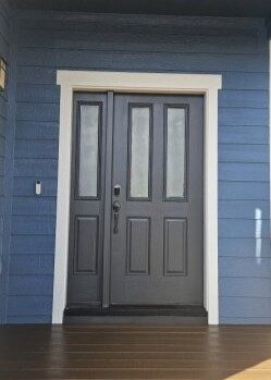 blue painted house exterior with brown painted front door Preview Image 3