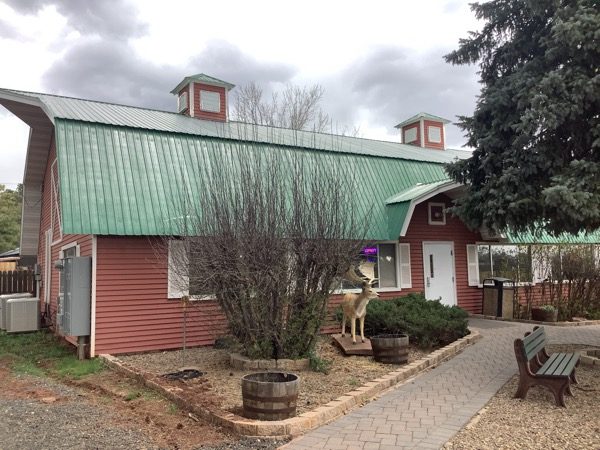faded red barn with green roof Preview Image 2