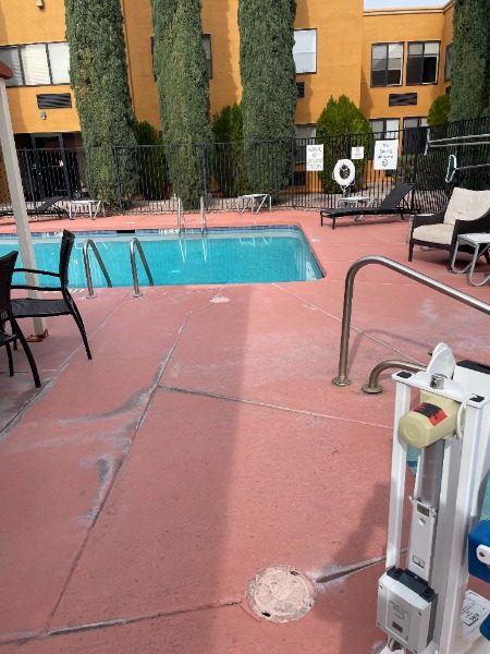 pool deck with cracks and worn paint Preview Image 2