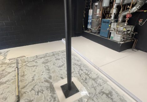 garage floor prepped for epoxy process