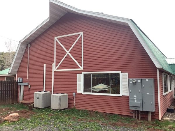 faded red barn with green roof Preview Image 1