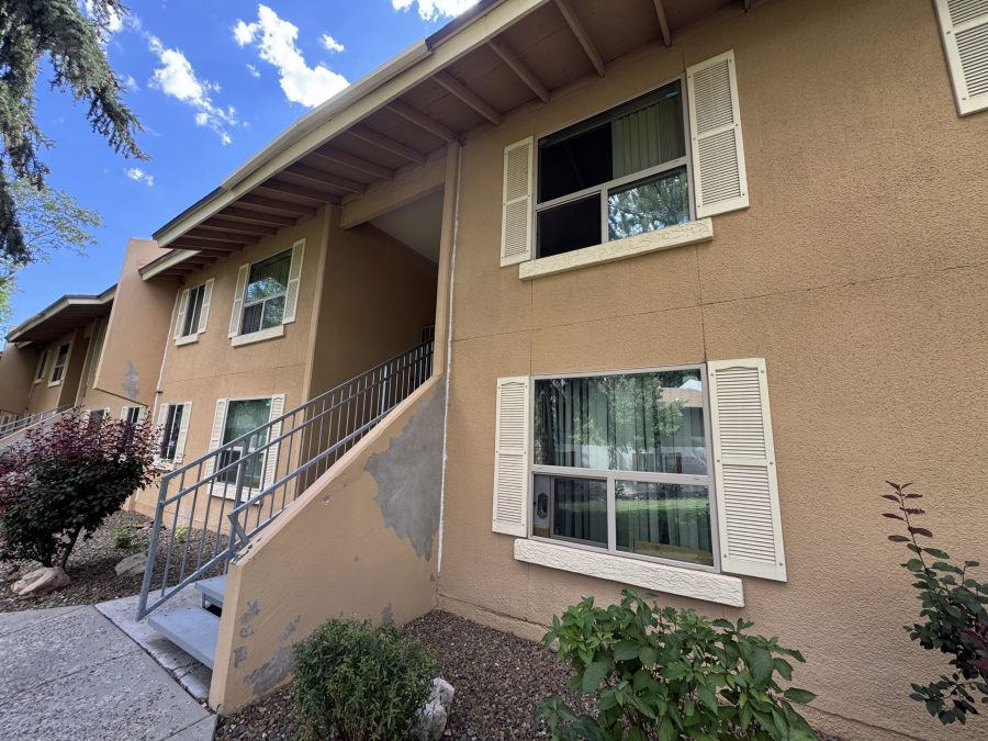tan stucco apartment building exterior with damage Preview Image 14