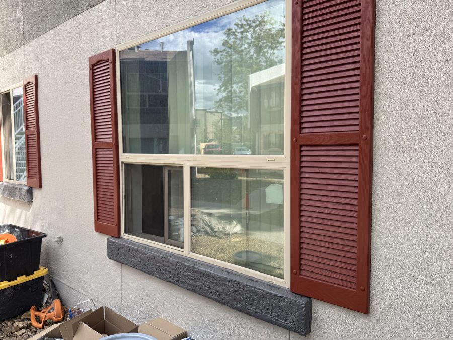 window with red painted shutters Preview Image 3