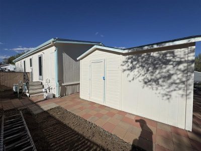 white house exterior with blue trim