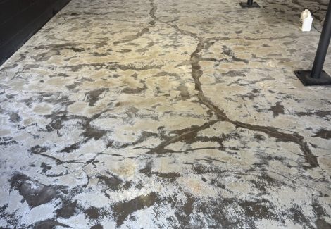 garage floor prepped for epoxy process