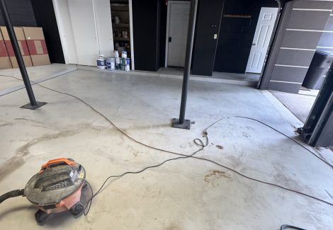 garage with unfinished floor
