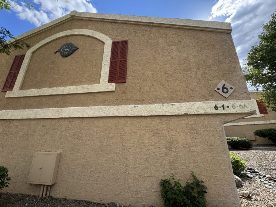 tan stucco apartment building exterior with damage Preview Image 12