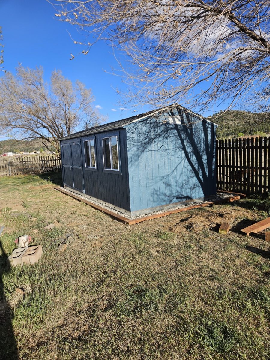 shed with blue painted siding Preview Image 2