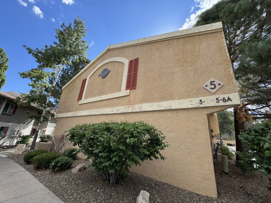 tan stucco apartment building exterior with damage Preview Image 13