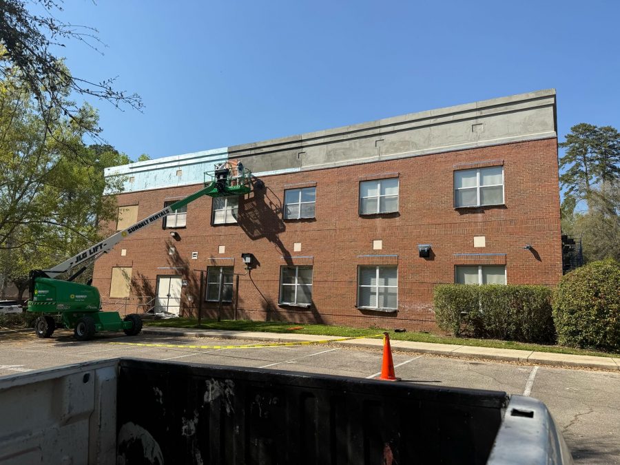 boom lift and exterior of commercial building during stucco install Preview Image 9