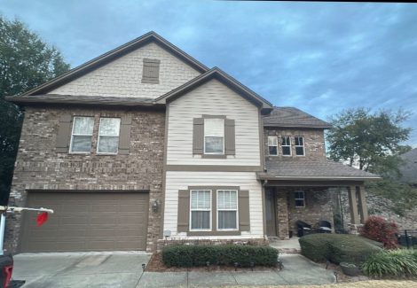 painted brick and stucco home exterior