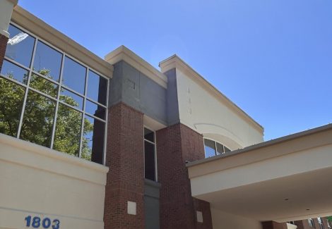 exterior of commercial building during stucco install