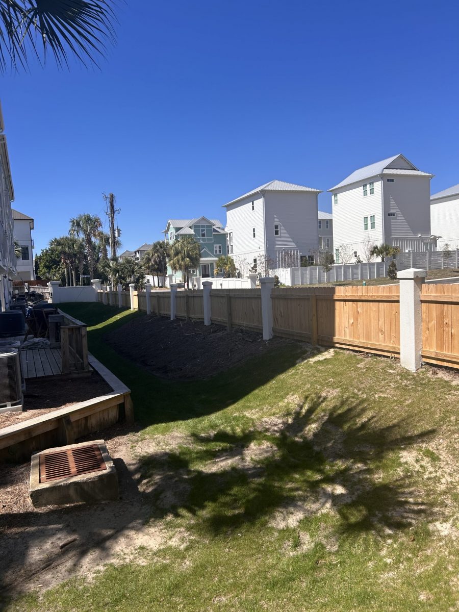 wooden condo community fence with white painted posts Preview Image 5