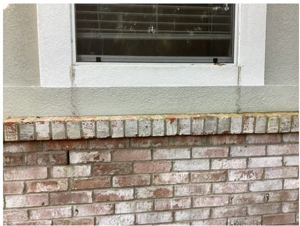 worn stucco and brick exterior Preview Image 5